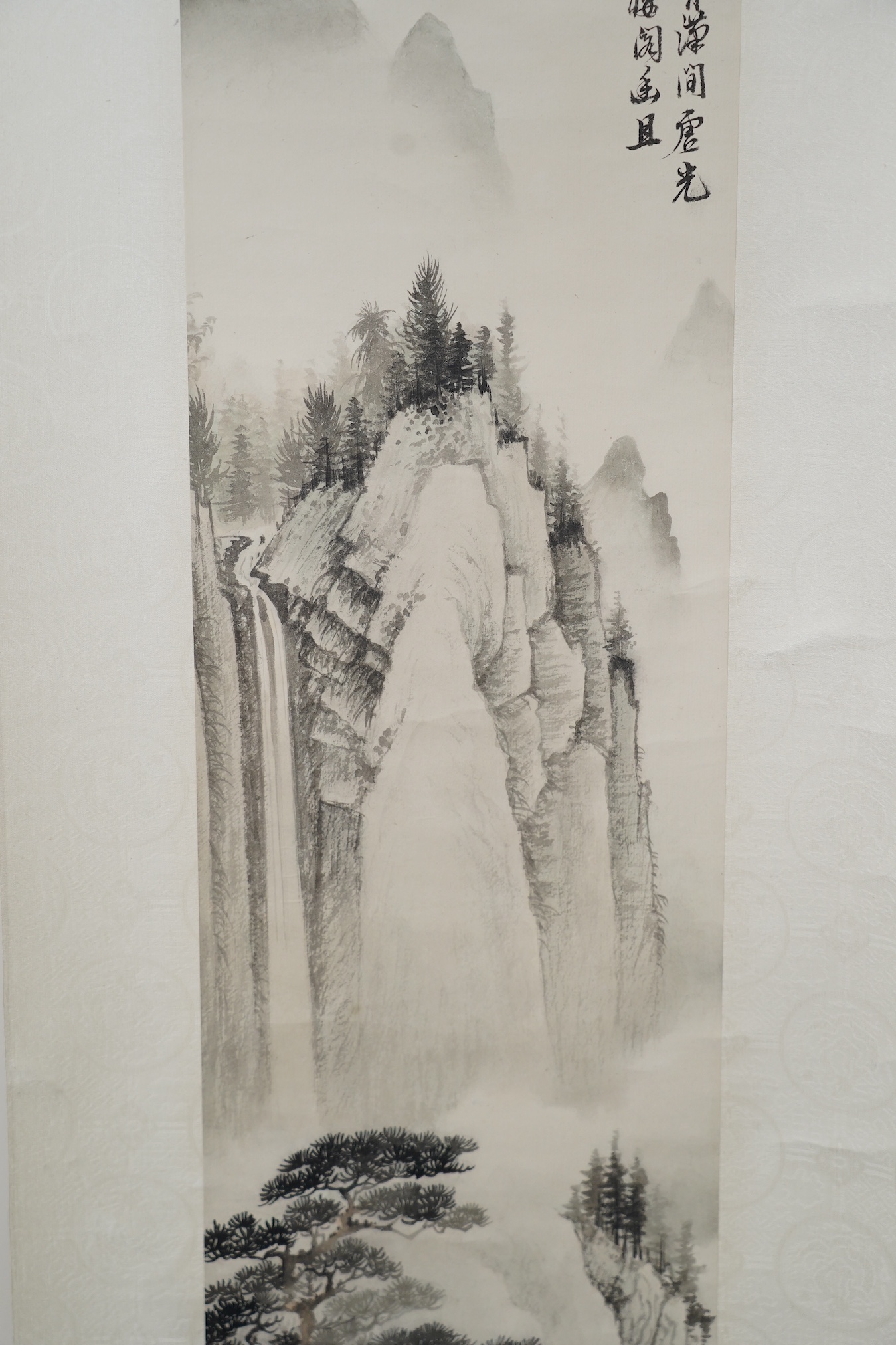 Manner of Huang Junbi, 20th/21st century, a set of four scroll paintings on paper of mountainous landscapes, boxed. Condition - fair to good